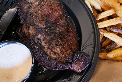 Smoked Seasoned & Seared Ribeye, Corn Casserole, Mississippi Mud Pie icon